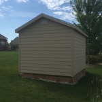 Custom gravel pad for extreme slope of yard